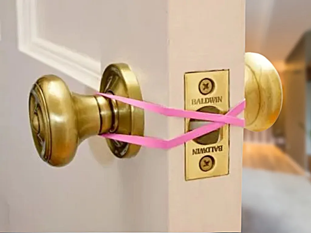 Slip a Rubber Band Over the Door Latch—Here’s Why